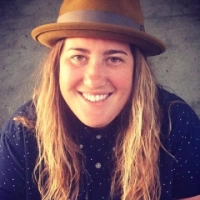 Photo of Kelsey Hoshide from OTS sharing his experience working with EvinceDev on port chassis management software project