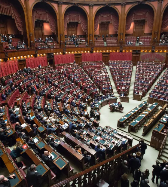 Interior view of an Italian parliamentary chamber with attendees