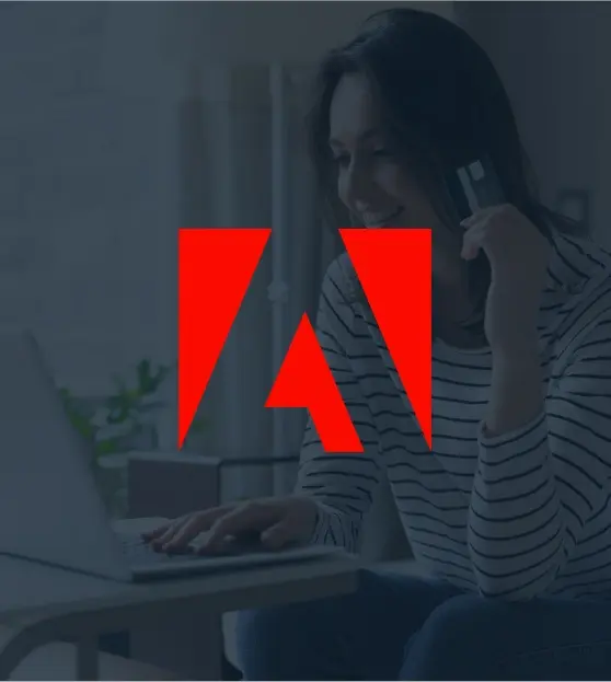 Woman shopping online with a laptop and credit card