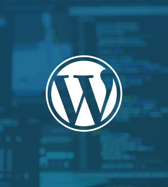 WordPress logo over blurred code background